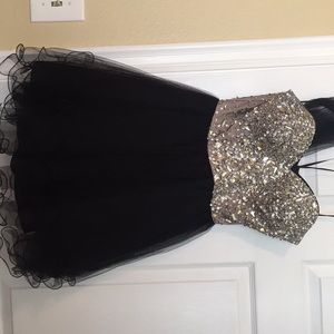 Beige and black formal dress